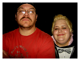 The bandanna, and the fact that he's near Christina, renders Henry inable to smile.
